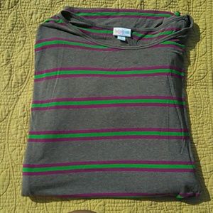 Irma. Been worn twice. Has a stain