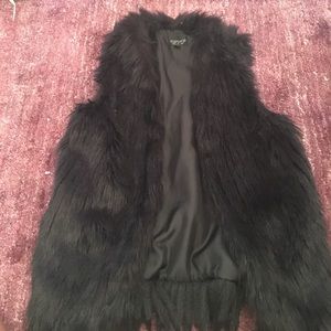 Black faux fur vest