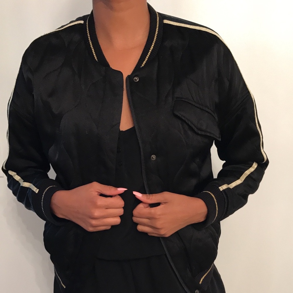 Cute Bomber Jacket with print on the back.