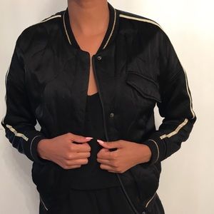 Cute Bomber Jacket with print on the back.