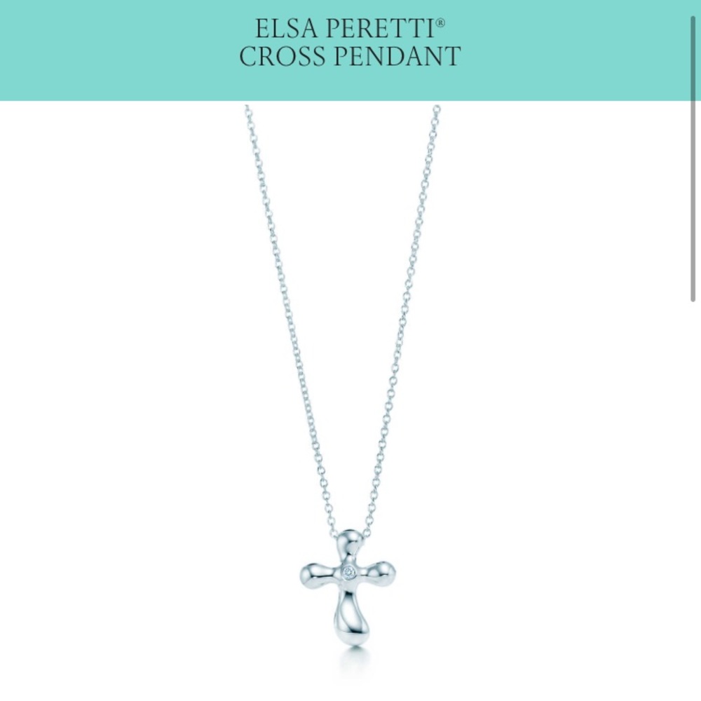 Tiffany & Co. sliver cross necklace w/ diamond