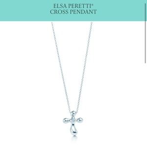 Tiffany & Co. sliver cross necklace w/ diamond