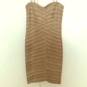 Beautiful BCBGMAXAZRIA gold weaved bandage dress