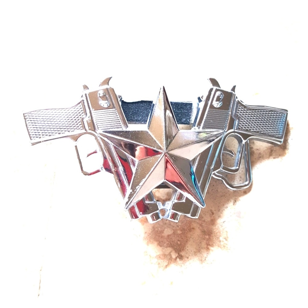 Blazin guns belt buckle.