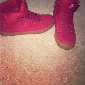 Red high top supras