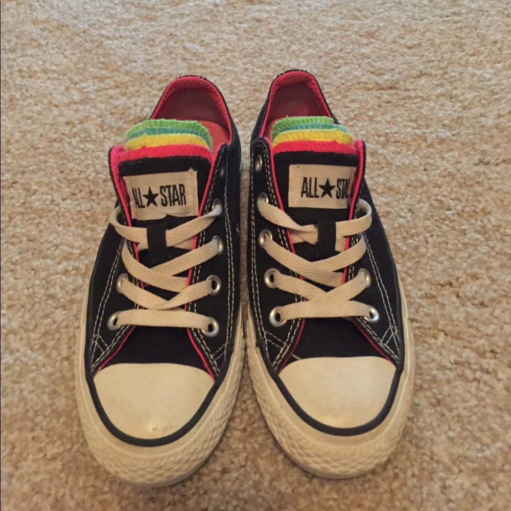 All black converse with multi-colored tongue