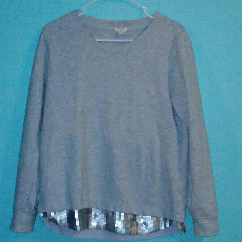 Sweatshirt with sequin hemline
