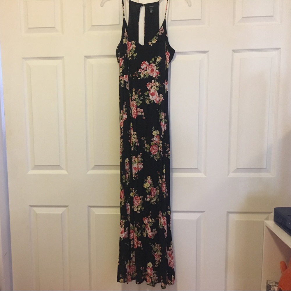 Long flowered dress with side cutouts