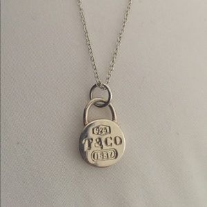 Tiffany & Co. silver lock pendant