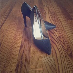Brand new never worn black pumps