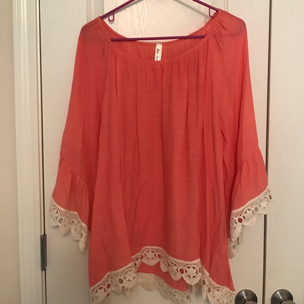Womens small peach blouse with crochet.