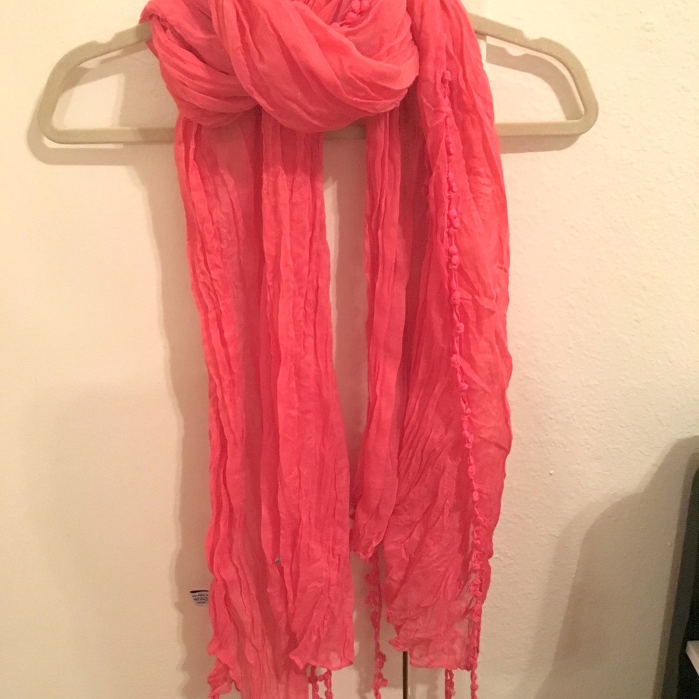 Pink tasseled scarf