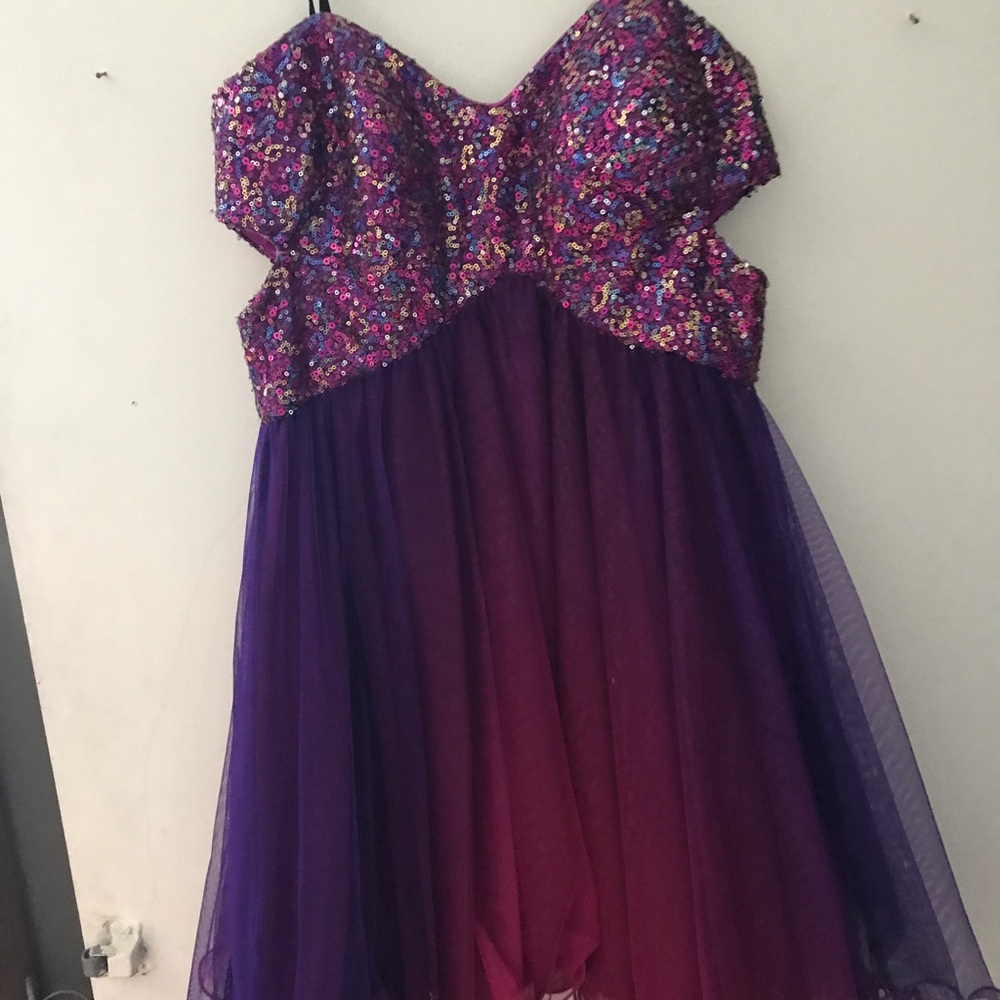 Fun mini party dress it has cut outs on the side