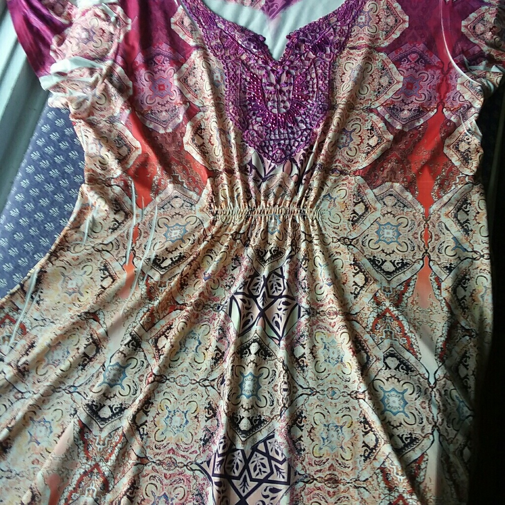 Pink and cream colored tunic