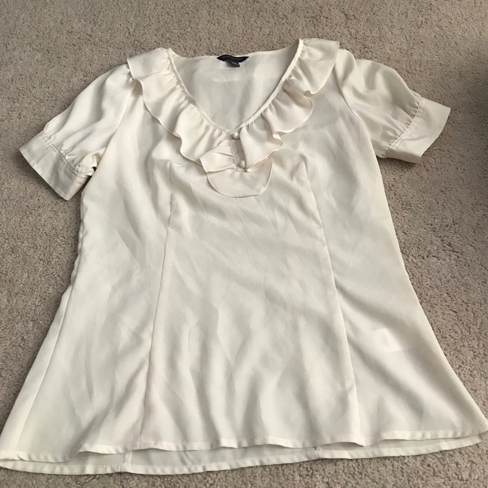 White ruffled top
