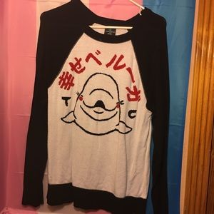 Tyler Carter collection beluga whale sweater.