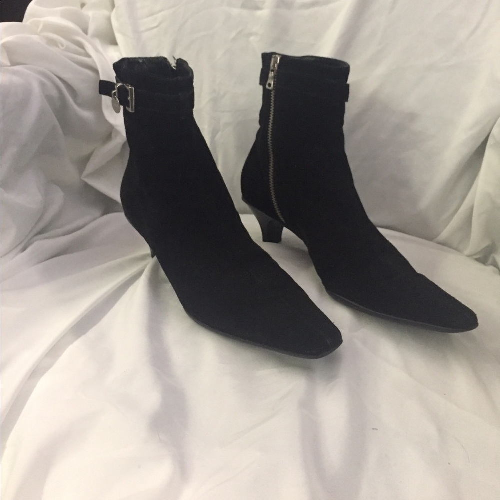 Prada ankle booties with a kitten heel.