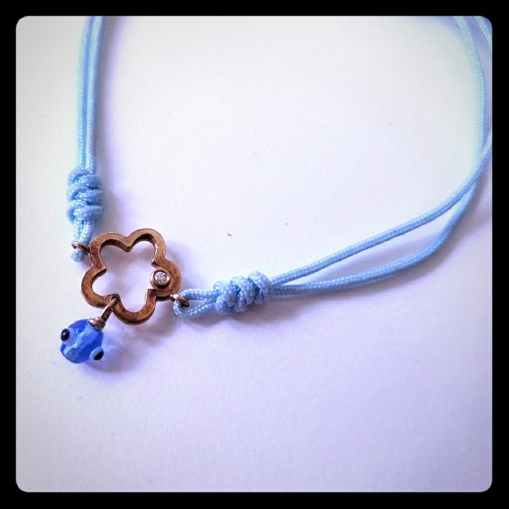 Gold and diamond evil eye bracelet