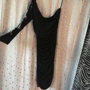 Black, one shoulder dress.