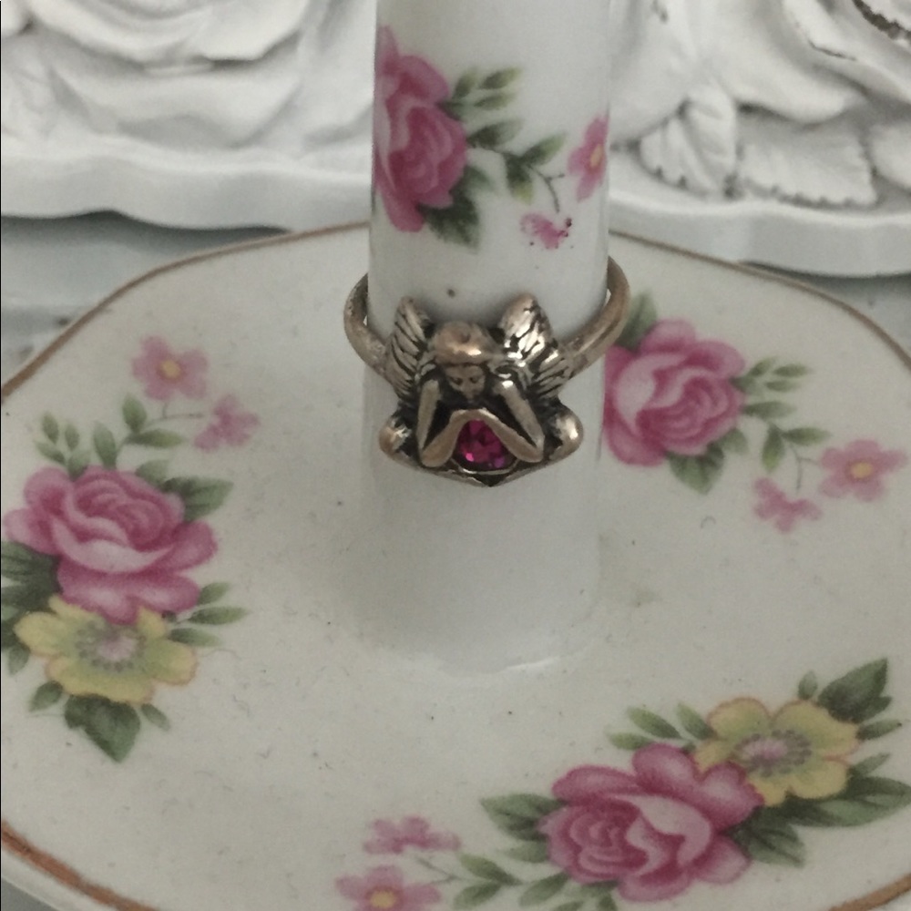 Silver ring with fairy and pink gemstone