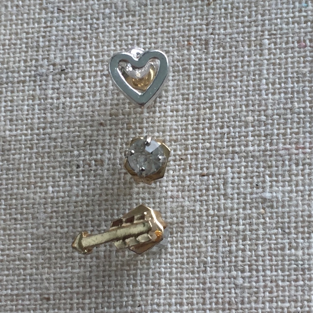 Set of 3 single earrings.