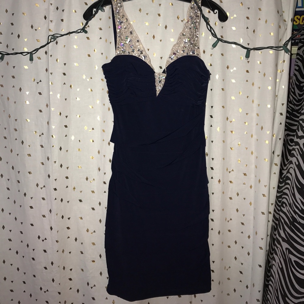 Form fitting dress.