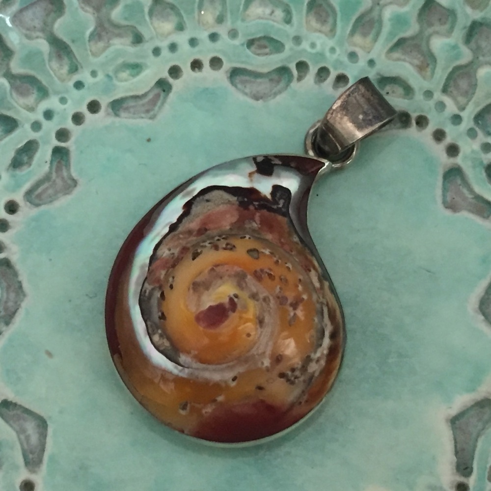 Shell and silver pendant