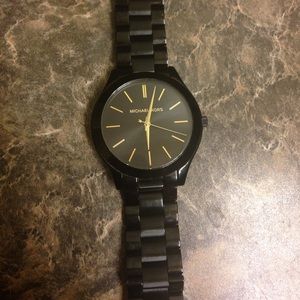Black and gold Michael Kors watch