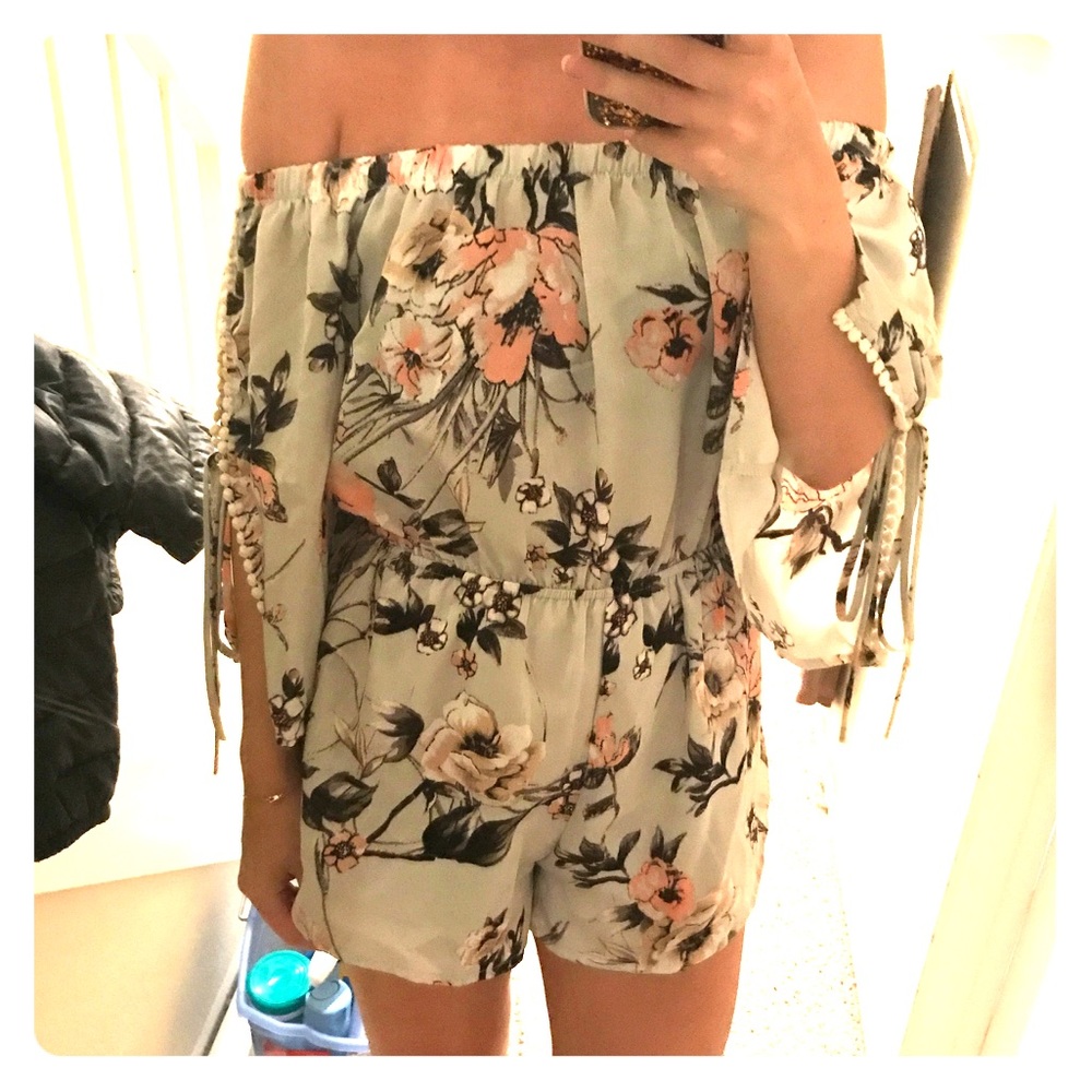 Off the shoulder, grey print romper. Never worn.