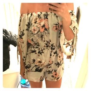 Off the shoulder, grey print romper. Never worn.
