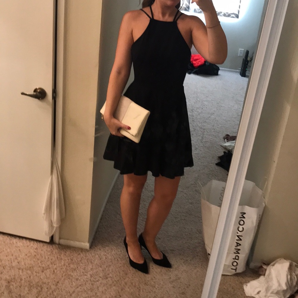 Black, strappy peplum dress.