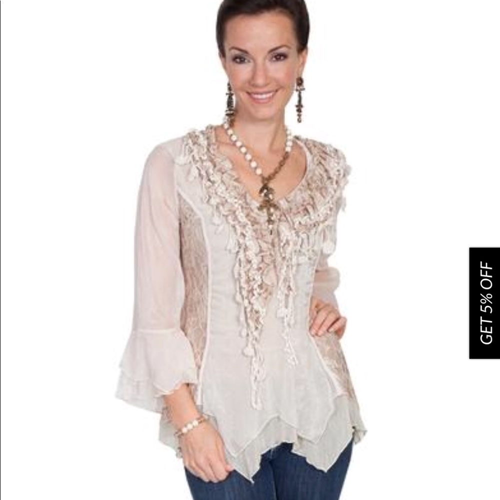 The perfect top for dress up or down.