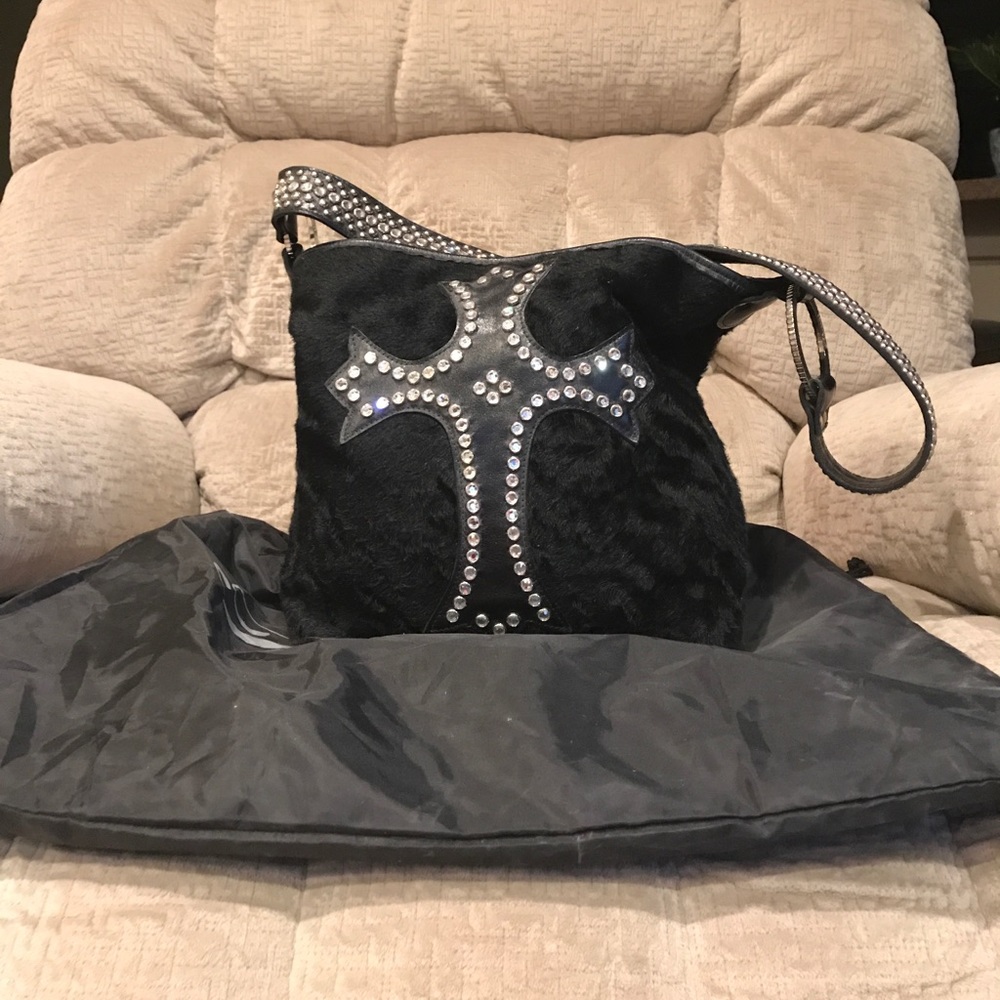 Raviani animal hide purse.