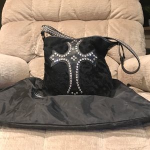 Raviani animal hide purse.