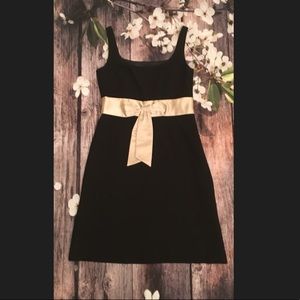 Ann Taylor black cocktail dress with gold bow