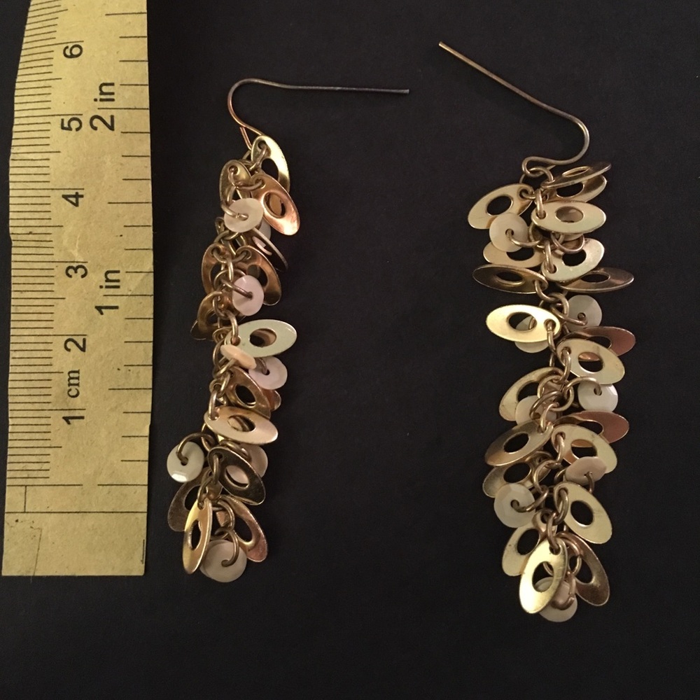 Gold and white hanging earrings