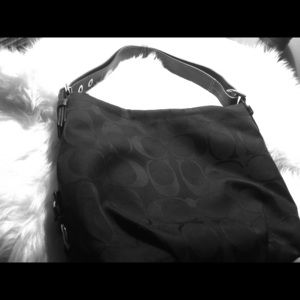 Black Coach purse - id number is photographed