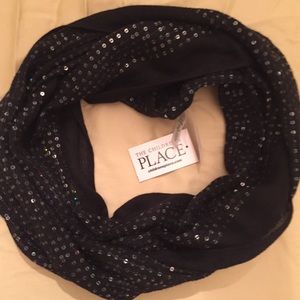 Black scarf with sequins.