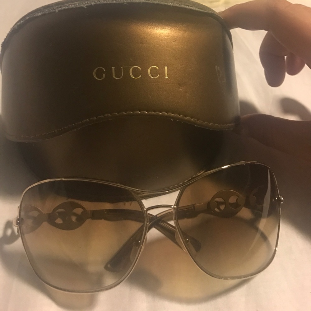 GUCCI gold/brown ombré sunglasses.