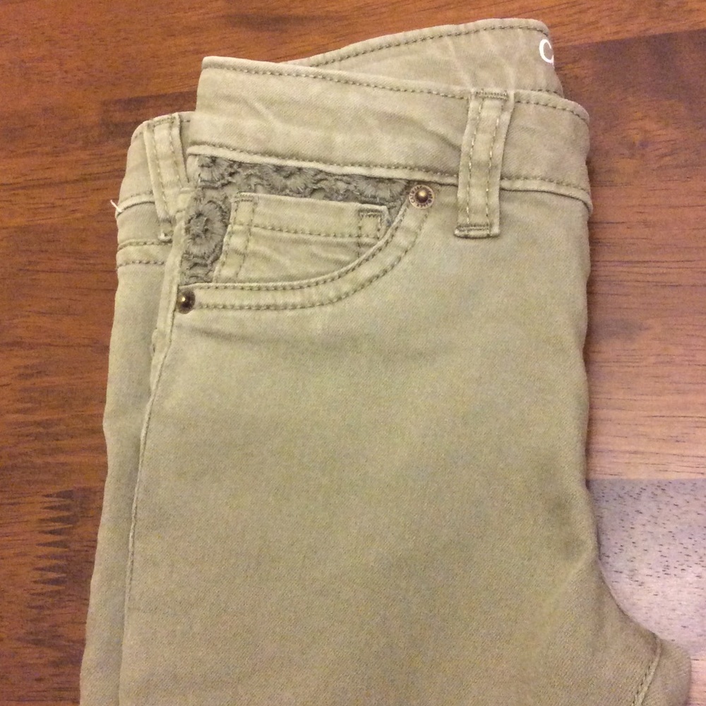 Never worn! Olive green jeggings w/ lace accents