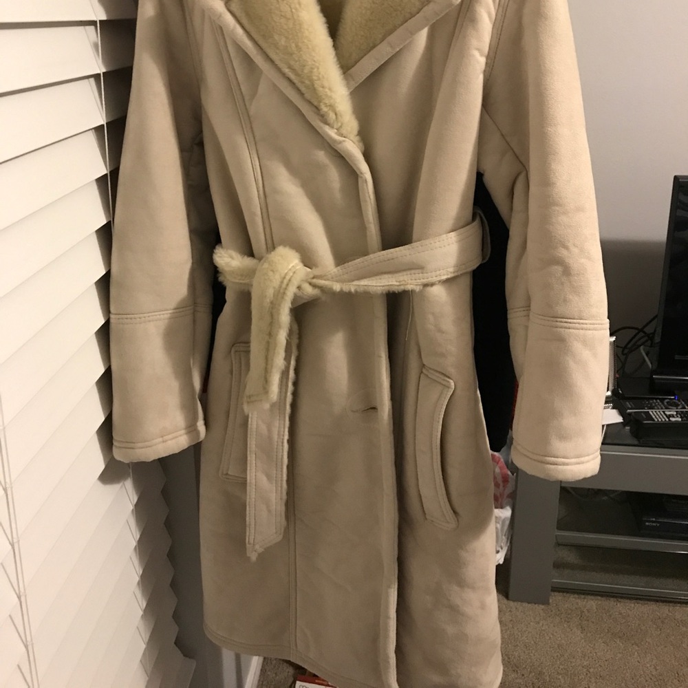 New. Ladies real sheep jacket. I believe not the entire jacket is sheep.