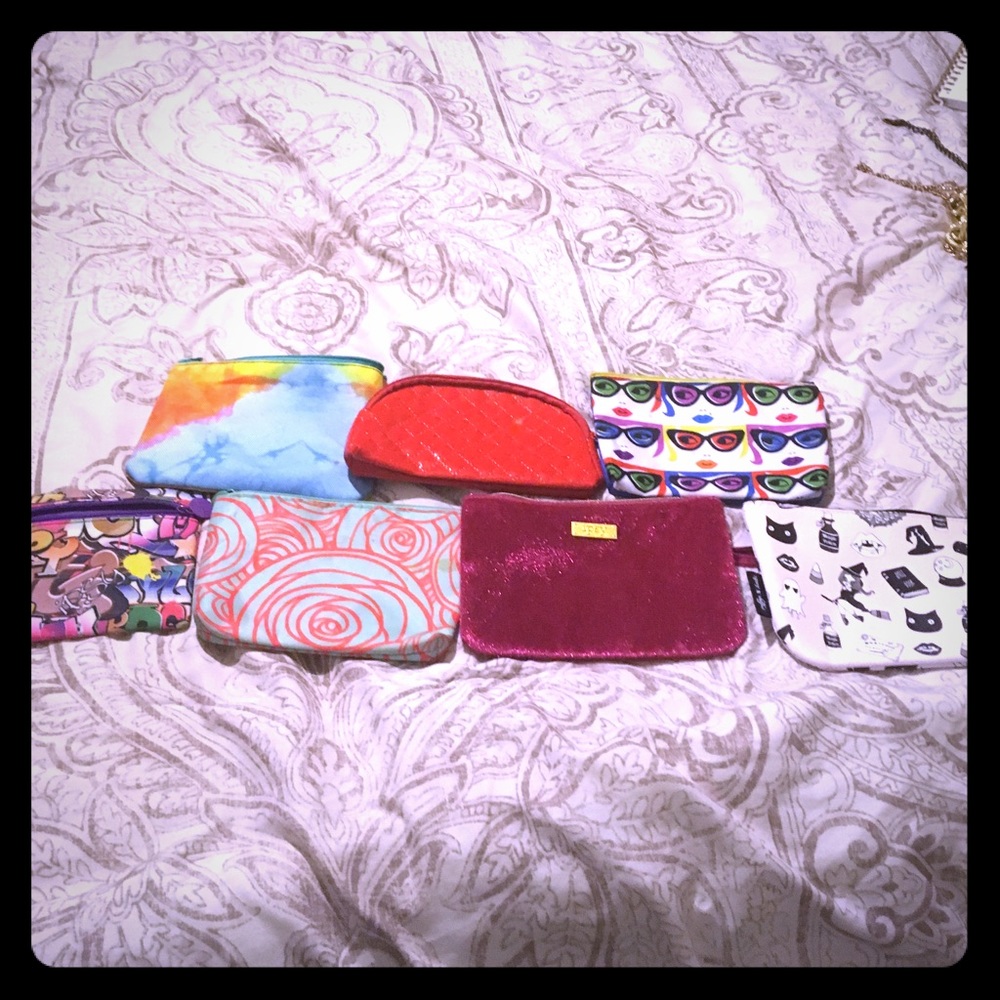 Seven Ipsy make up bags