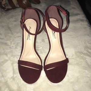 Burgundy strappy heels. Burgundy strappy heels.