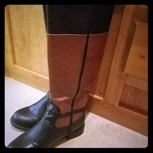 Black and tan leather knee-high boots
