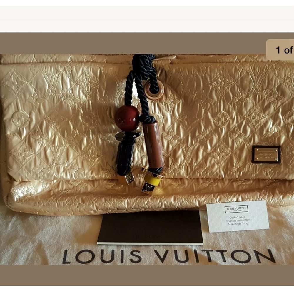 Loius Vuitton Pochette doree printemps 2009. New!