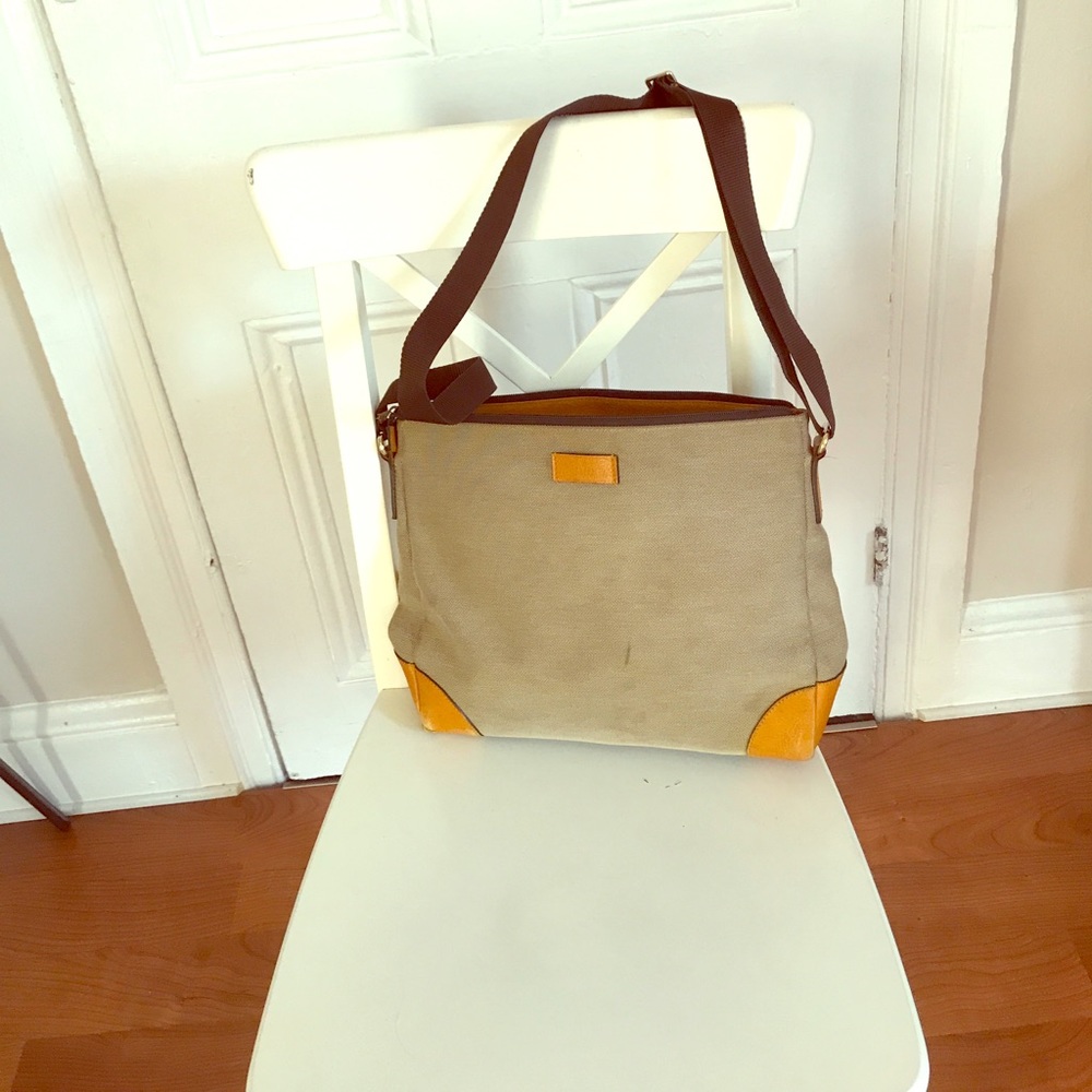 GUCCI BAG. Canvas material. Camel leather edges.