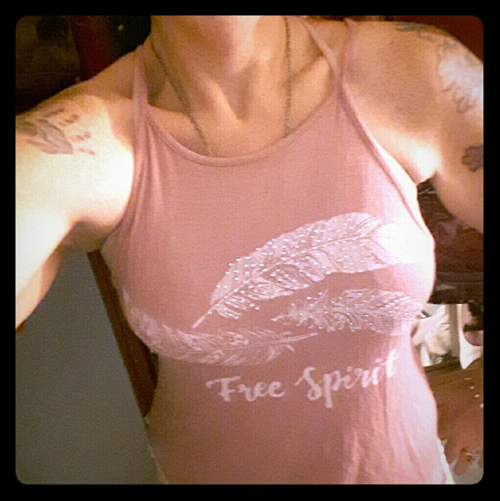 Pink tank outlined with white.