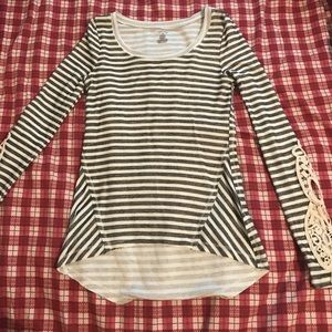 A Small Long Sleeved Striped Shirt