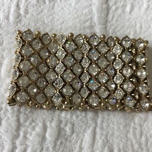 Gold and glass designer costume bracelet