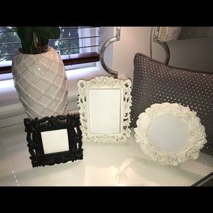 3 picture frames - two white, one black